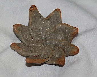 little ceramic flower