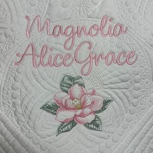 Magnolia flower embroidered baby heirloom quilt