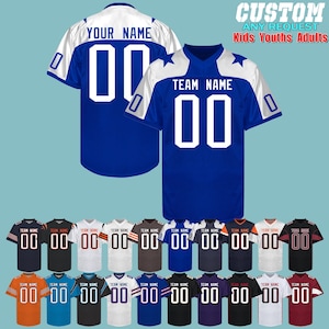 May include: A selection of customizable football jerseys in various colors, including black, white, orange, blue, and red. The jerseys feature a white star on the shoulder and the text "TEAM NAME" and "00" on the front. The text "CUSTOM ANY REQUEST Kids Youths Adults" is displayed at the top of the image.