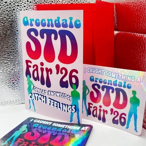 May include: Pink and red cards and stickers with the text "Greendale STD Fair '26". The cards and stickers have a retro design with silhouettes of people and the phrases "Spread Knowledge" and "Catch Feelings".
