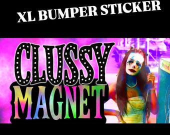 May include: XL bumper sticker with the words "CLUSSY MAGNET" in a colorful, stylized font. The image features a person with clown-like makeup holding a phone, set against a vibrant, purple and pink background.