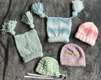 Hand knitted hats and bonnets for babies