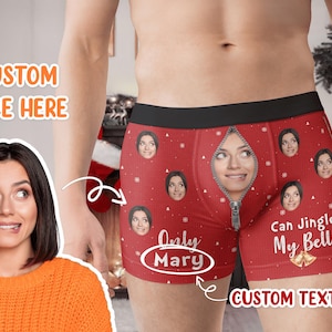 May include: Red and white boxer briefs with a zipper detail and a variety of faces printed on them. The text "Can Jingle My Bells" and "Only Mary" are printed on the boxer briefs.  "CUSTOM TEXT HERE" is printed at the bottom of the image.