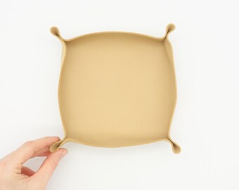 Aesthetic room decor, leather tray made of natural cowhide, perfect as home decor for storing everyday items.