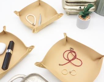 Aesthetic room decor, leather tray made of natural cowhide, perfect as home decor for storing everyday items.