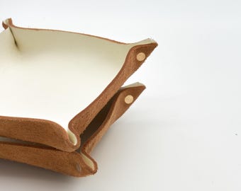 Leather tray made of natural cowhide, perfect as home decor for storing everyday items.