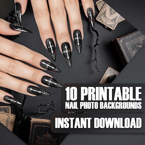May include: Black, coffin-shaped nail art with white cross designs and spiderweb accents. The image features the text "10 Printable Nail Photo Backgrounds Instant Download". The nails are long and pointed, with a gothic aesthetic.