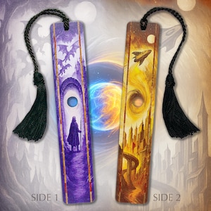 May include: Two fantasy-themed bookmarks with black tassels. One features a purple scene with dragons, a figure, and an archway. The other shows a yellow and brown scene with a rocket ship and city skyline. The text "SIDE 1" and "SIDE 2" are visible.