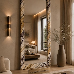 May include: A tall rectangular floor mirror featuring a thick frame with a white, gold, and dark purple marble pattern. A small rectangular plaque with the text AuraWoodAndStone is positioned at the base of the mirror on the floor.