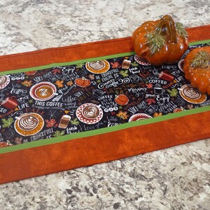 Pumpkin Spice Glow Quilted Table Topper NCU0NXD070