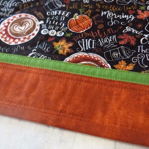 Pumpkin Spice Glow Quilted Table Topper NCU0NXD070 main image 1
