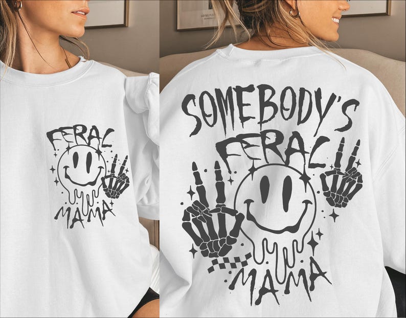 May include: White long-sleeve sweatshirt with a black graphic print of a smiley face with dripping eyes and the text "Somebody's Feraci Yu Yu Mama" with two skeleton hands making peace signs.