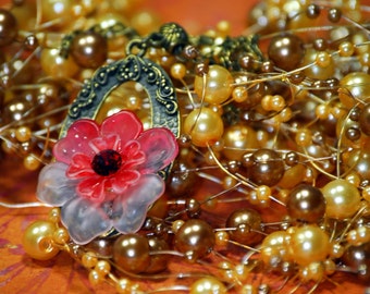 Un collar de diamantes de imitación Swarovski vintage rojo Fiery Skies de una sola floración