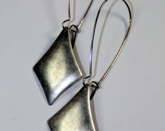 The Shimmer of Silver Dangle Earrings