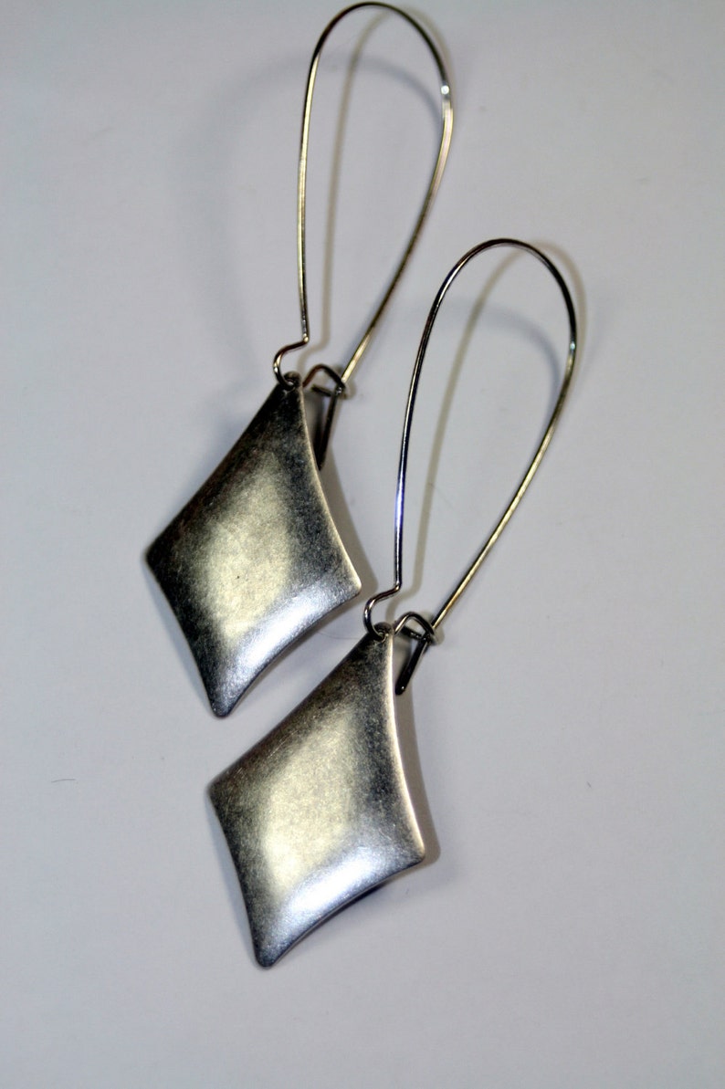 The Shimmer of Silver Dangle Earrings image 1