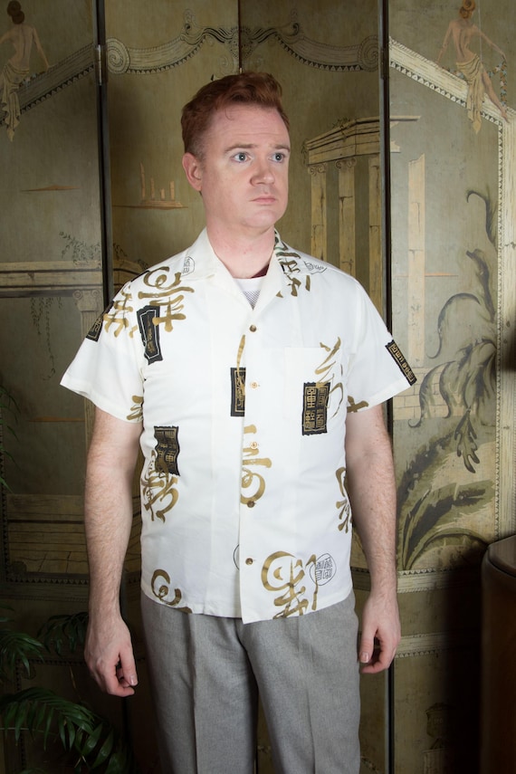 1960s ALFRED SHAHEEN Vintage Aloha Shirt From the 60s Hong Kong Series in Black and Gold on Crisp White Size Medium