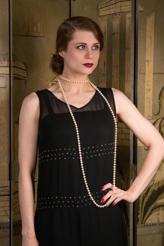 1920s little black dress The Evolution of the Little Black Dress