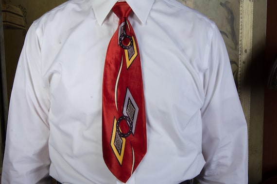 Vintage 1940s Ultra Shiny Bright Red Satin Wide Tie in with Diamonds and Ring Shapes in Yellow, Navy and Aviation Blue