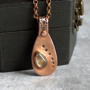 Soltar Necklace - Rutilated Quartz, Yellow Gold Inclusions, Copper Teardrop, Gemstone Pendant, Oxidized Patina, Riveted Metalwork Jewelry