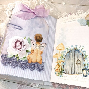 May include: A purple and white scrapbook page with a fairy, a rose, and a door with mushrooms. The page has a purple ribbon and lace trim.