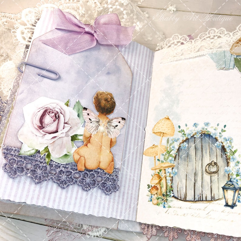 May include: A purple and white scrapbook page with a fairy, a rose, and a door with mushrooms. The page has a purple ribbon and lace trim.