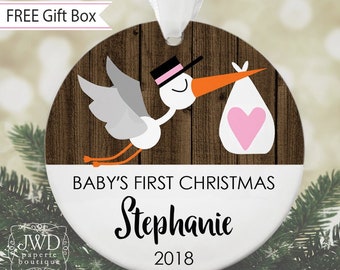 Baby Girl First Christmas Ornament Personalized Baby Ornament My First Christmas Stork Faux Wood Background Ceramic Ornament