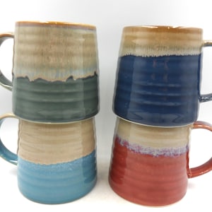 Set of 4 Reactive Glaze Creme Brulee Mugs in assorted seashore glazes.
