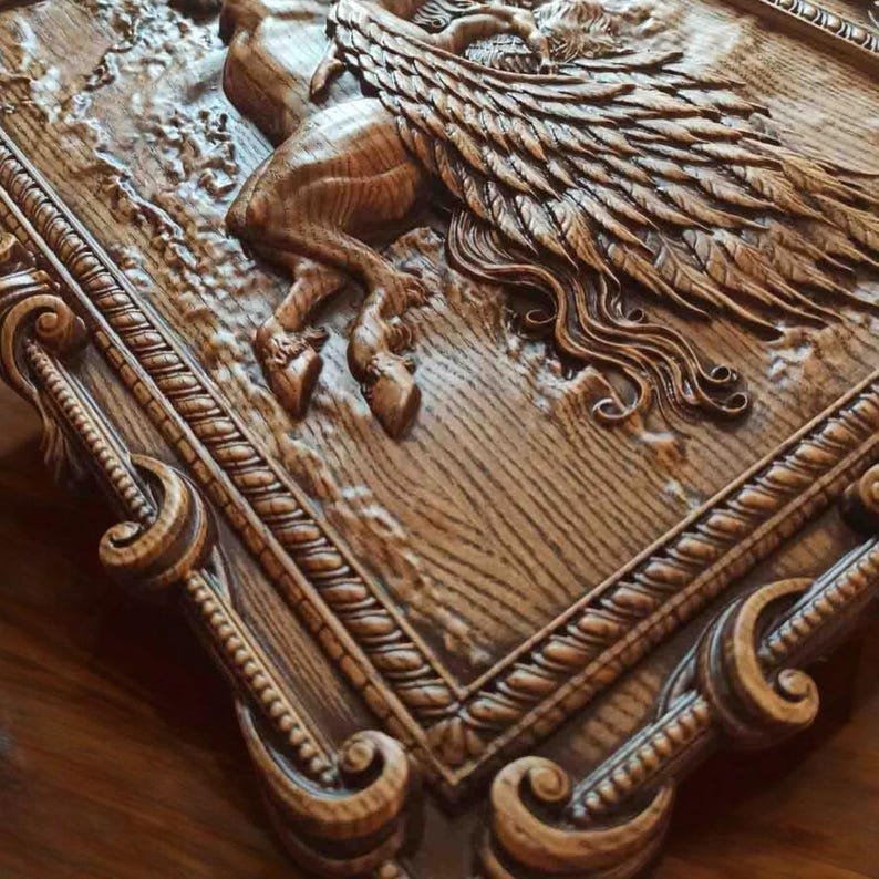 May include: A wooden wall plaque with a detailed carving of a winged horse, or Pegasus, in a decorative frame. The wood is a rich brown color and the carving is very intricate.