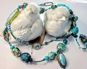 Turquoise handpainted beads with treasure necklaces