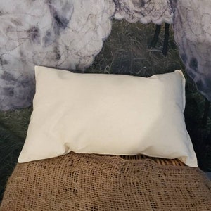 Neck or Travel pillows - 100 % organic wool filled and cotton covers Chemical Free. Great for lumbar, neck support & between the knees.