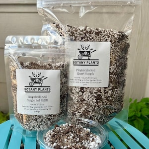 May include: Three clear plastic bags and a small container filled with Pinguicula soil. The bags have white labels with the "Botany Plants" logo and text describing the soil's volume and use for filling pots and propagating leaf pullings.