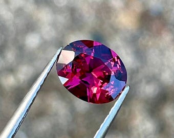 1,45 karatów różowo-czerwony granat kamień owalny naturalny tanzański kamień szlachetny