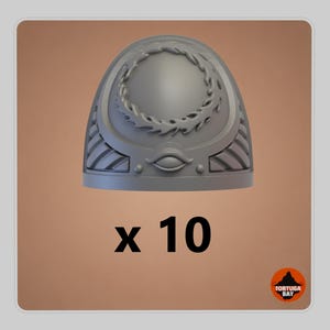 May include: A set of ten grey shoulder pads for miniature figures, each featuring a raised circular laurel wreath emblem at the top and a central eye motif above horizontal decorative lines at the base. The text x 10 is printed below.