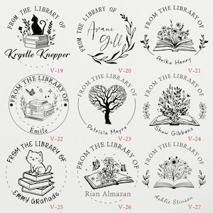 May include: Nine round black and white rubber stamps with different designs. Each stamp has the text "From the Library of" and a name. The designs include a cat, a tree, a book with flowers, and a book with butterflies.