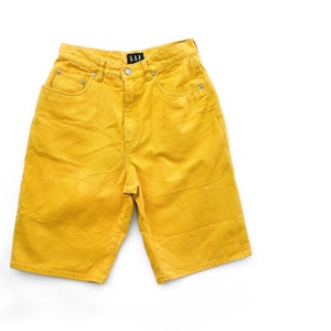 90s bright yellow high waisted Gap shorts