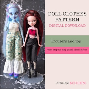 May include: Two dolls wearing handmade outfits with text reading DOLL CLOTHES PATTERN DIGITAL DOWNLOAD Trousers and top with step-by-step photo instructions Difficulty: MEDIUM. One doll has blue skin and long pastel hair, the other has dark red hair.