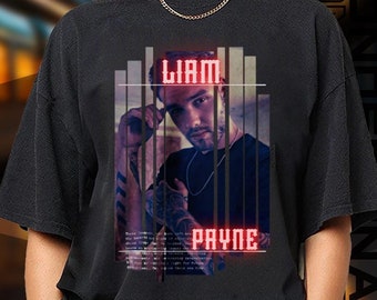 May include: Black t-shirt with a graphic of Liam Payne in a red neon frame. The graphic includes the text "Liam Payne" in red neon.
