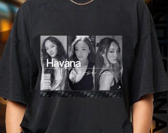 May include: Black t-shirt featuring a black and white graphic of a woman in three panels. The word "Havana" is printed in white, with the name "Rose Lin" in cursive below the word "Havana".