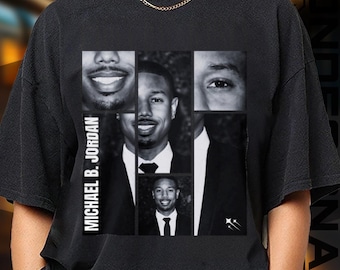 May include: Black t-shirt featuring a collage of black and white images of Michael B. Jordan. The design includes close-ups of his face and the text "MICHAEL B. JORDAN" in white vertical letters.