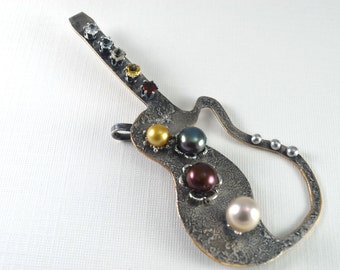 Silver guitar pendant with freshwater pearls, faceted gemstones