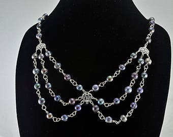 Black peacock freshwater pearl bib sterling silver necklace