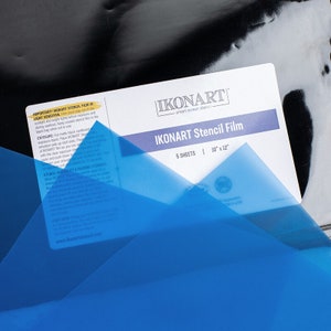 May include: A pack of five 10x12 inch IKONART Stencil Film sheets. The packaging is white with blue and black text. The text on the packaging reads "IMPORTANT! IKONART STENCIL FILM IS LIGHT SENSITIVE. Must avoid direct sunlight and bright lights before exposure and during washout. Keep unused stencil film in the black bag when not in use."