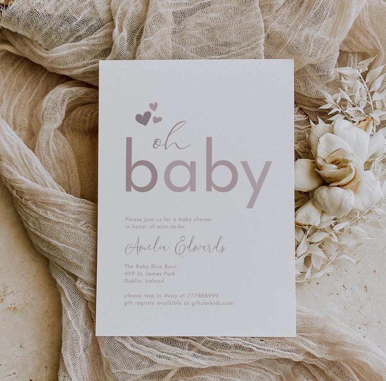 May include: A white baby shower invitation with pink hearts and the text "oh baby" in a pink gradient. The invitation includes the name "Amelia Edwards" and details for the shower, including the location, date, and RSVP information.
