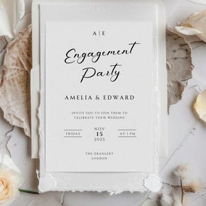 May include: White engagement party invitation with elegant script text. The invitation includes the names Amelia & Edward, date, time, and location: The Orangery, London. The invitation is on a textured background.