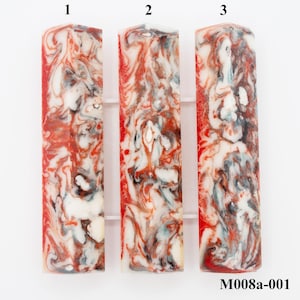 May include: Three rectangular resin pieces with a marbled pattern in red, white, and gray. The pieces are vertically oriented and have a glossy finish. The text "M008a-001" is printed in black at the bottom right.