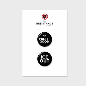 May include: A white card with the text "THE RESISTANCE COLLECTION" and two black circular buttons. The top button says "BE PRETTI GOOD" and the bottom button says "ICE OUT" in white text.