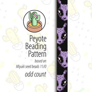 Puede incluir: Un patrón de abalorios peyote para un cactus morado con ojos negros sobre un fondo negro. El patrón se basa en cuentas de semillas Miyuki 11/0 y utiliza un conteo impar.
