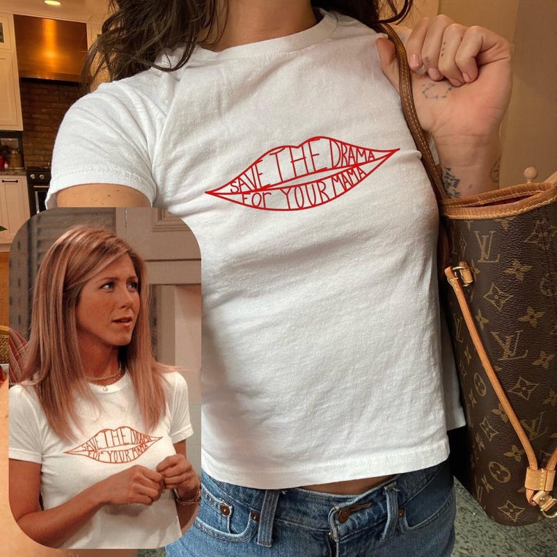 Vintage 2000s graphic ‘ 2 Heroes are better than 1’ baby tee