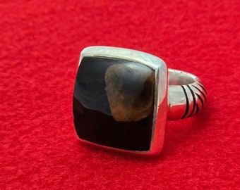 Beautiful black agate and saffron agate on a 990 Sterling Silver size 9.5 ring