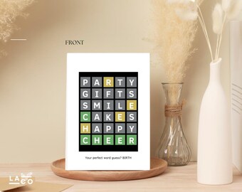 May include: A white greeting card with a word puzzle design. The puzzle spells out words like PARTY, GIFTS, SMILE, CAKES, HAPPY, and CHEER. The text at the bottom reads, "Your perfect word guess? BIRTH."